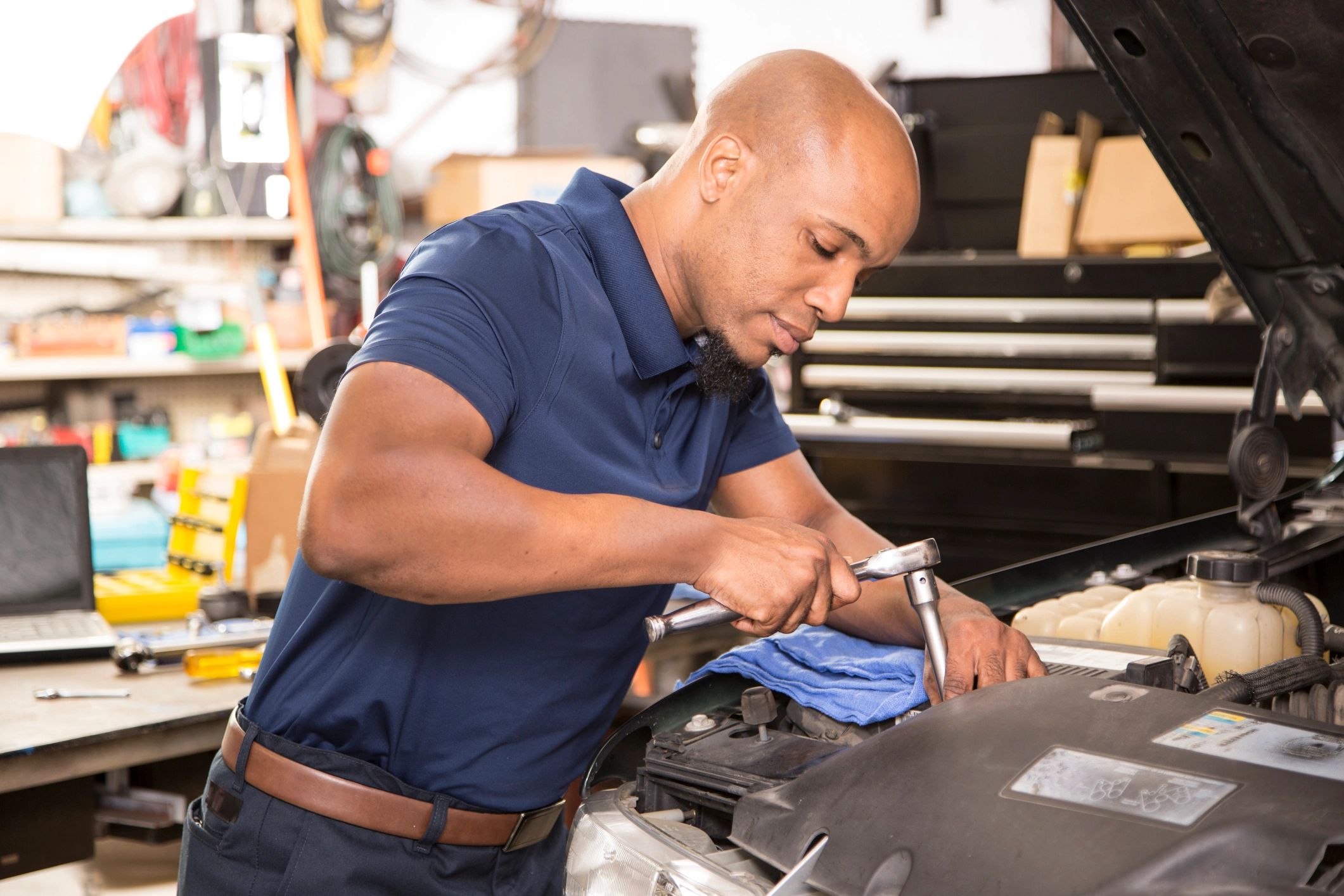 ASE certified mechanic working